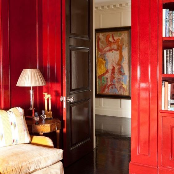 glossy red living room with panelling