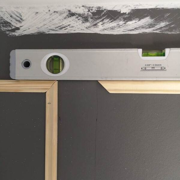 using a spirit level to get panelling levelled