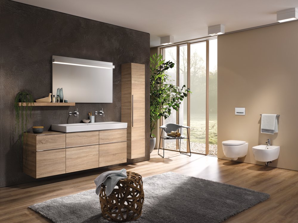 SPA bathroom with greenery and wood tones by geberit