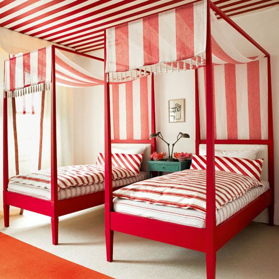 red and white stipes in a twin bedroom 