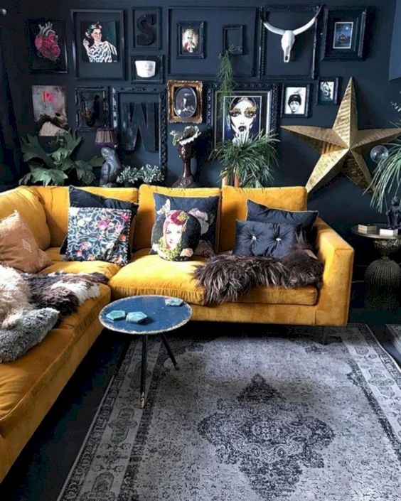 Gorgeous yellow sofa over at Hilary and Flo, paired with a dark wall it makes the room feel really positive but grounded