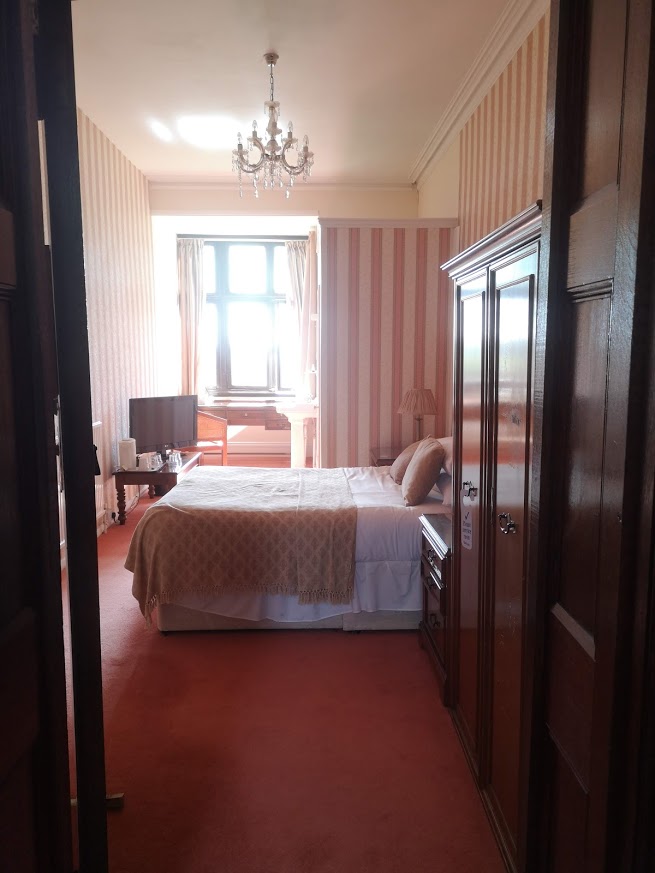 un renovated dated hotel bedroom