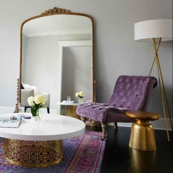 violet purple accent chair with gold accessories