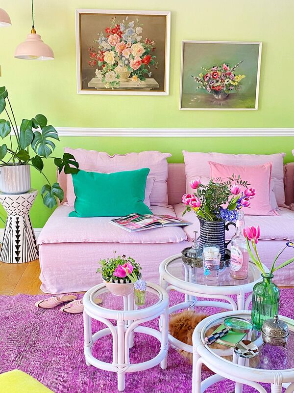 zingy green ombre wallpaper and pink linen sofa