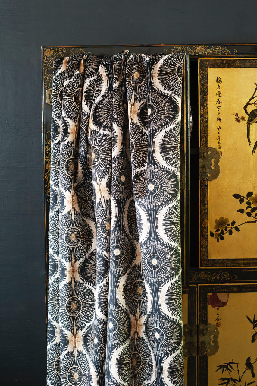 bibana velvet fabric by anna hayman draped over a gorgeous cabinet