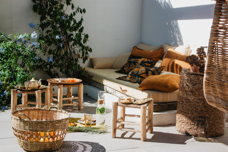 burnt and sun bleached oranges in this cosy outside space by Yasmine Boheas